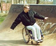 A picture of me trying to drive my wheelchair in a skateboard ramp, with less success, I might ad. 